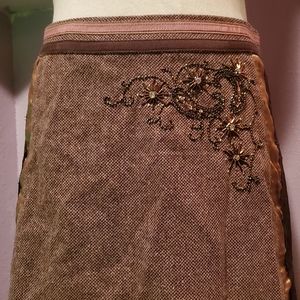 Beautiful tweed skirt with rhinestones and laced